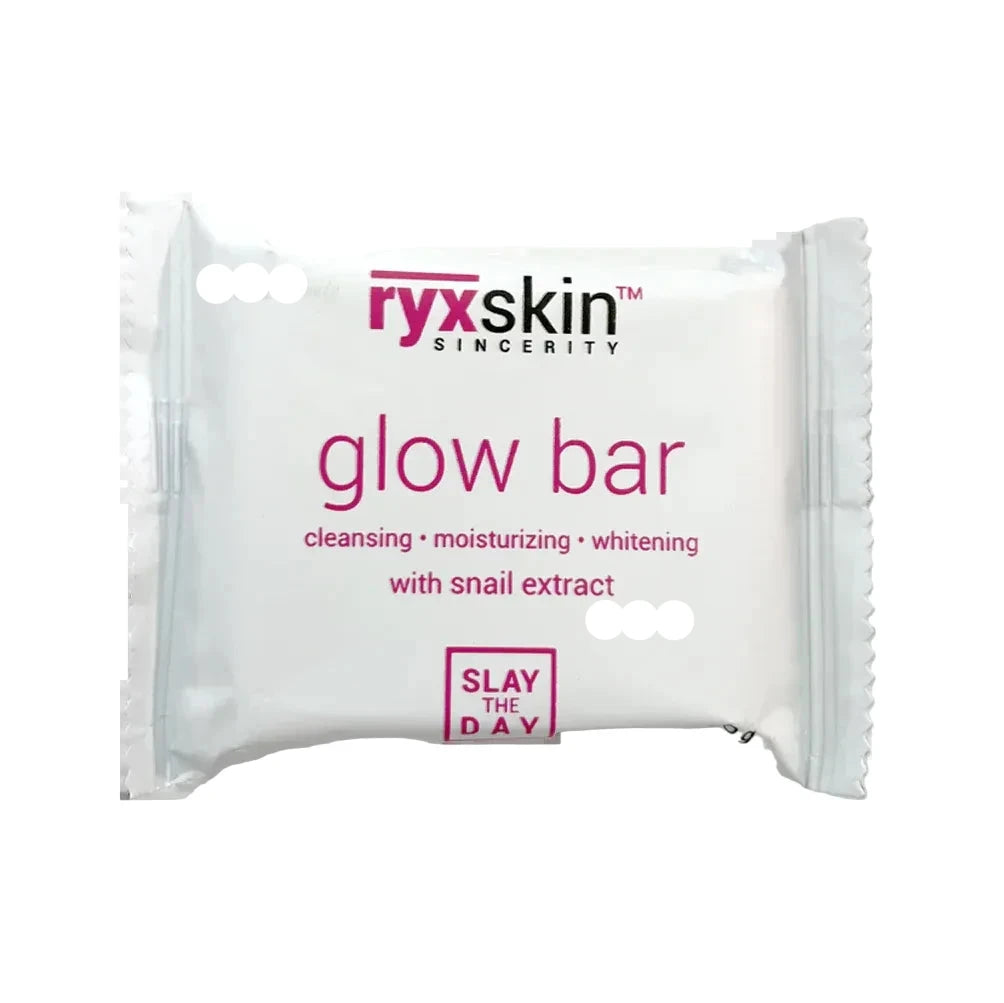 White packaging of ryxskin glow bar with pink text on a white background