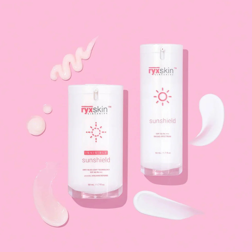 Two bottles of ryxskin sunshield on a pink background