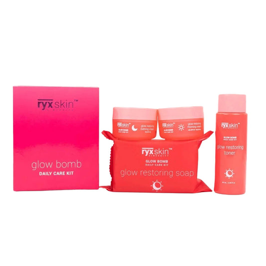ryx skin glow bomb daily care kit with pink packaging on a light pink background