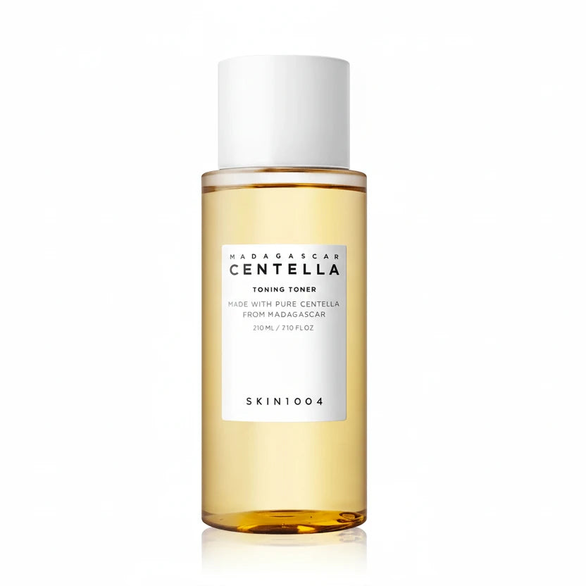 A clear bottle containing yellow-toned liquid with a white cap, labeled 'CENTELLA TONING-toner' and 'SKINT004'.