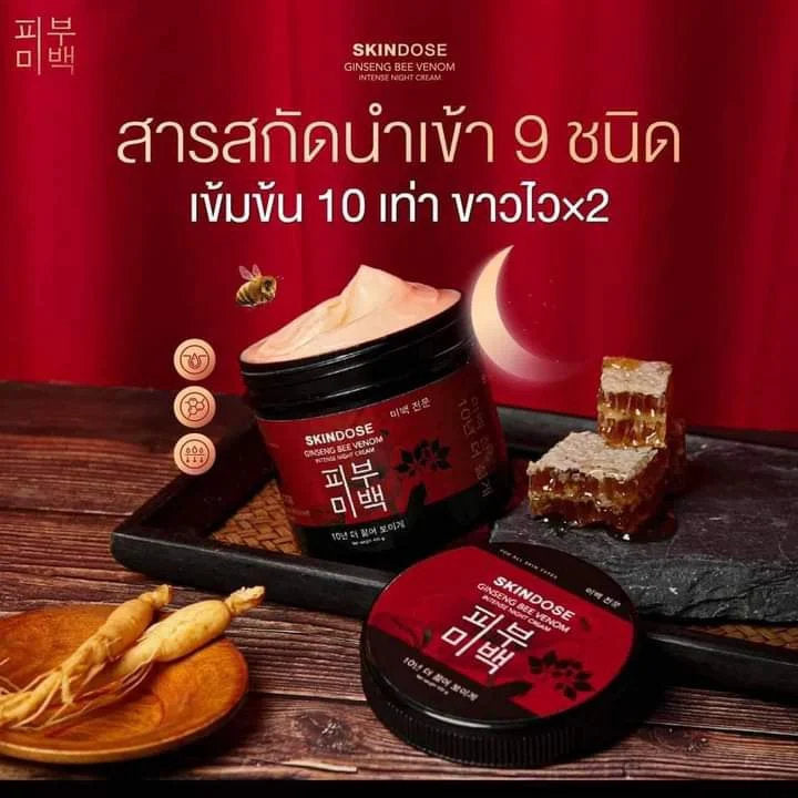 SKINDOSE product with ingredients on a wooden surface against a red background