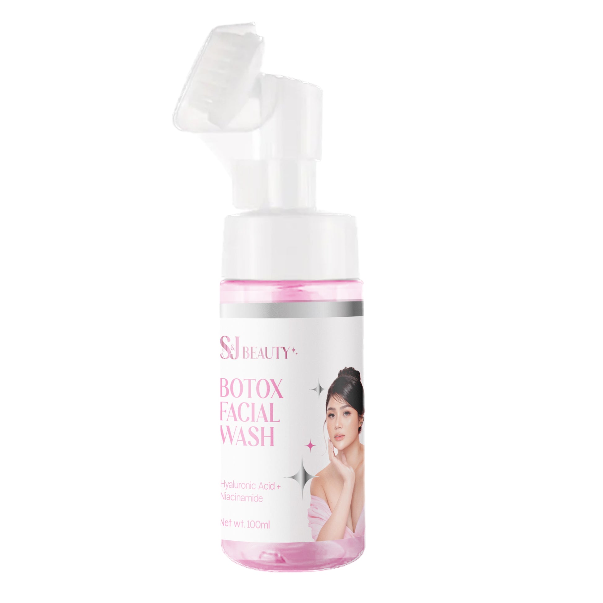 Facial wash bottle with pump and pink label on a white background