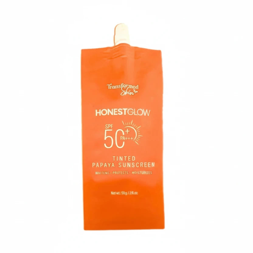 Orange sunscreen pouch with 'Honest Glow' branding on a white background
