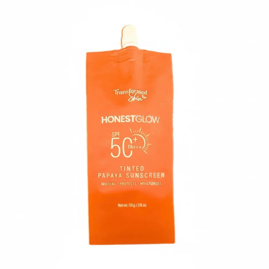 Orange sunscreen pouch with 'Honest Glow' branding on a white background