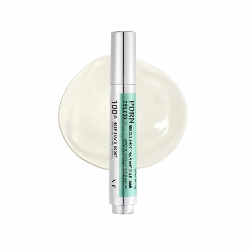 Skincare product with a silver tube and green label on a white background