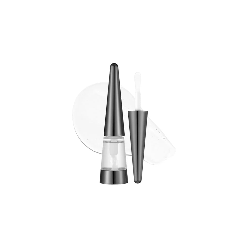 Silver cosmetic applicator on a white background
