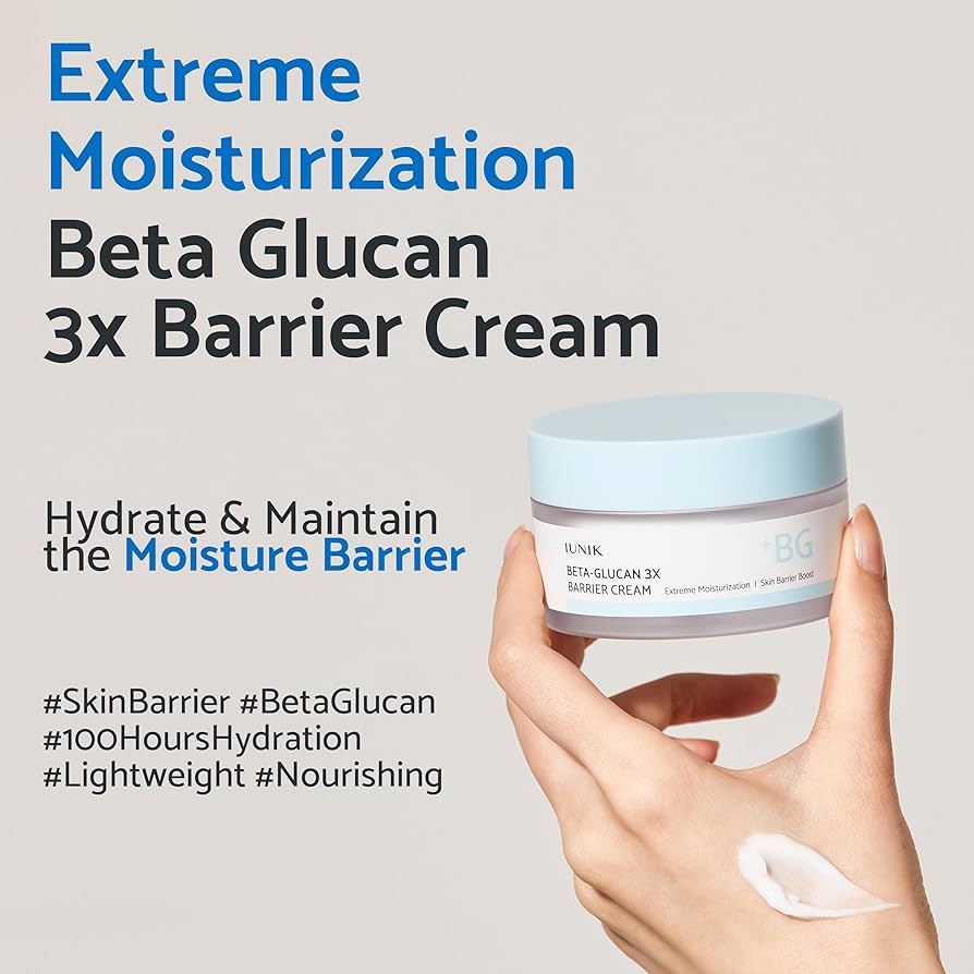 Jar of Beta Glucan 3x Barrier Cream held by a hand with promotional text on a light gray background